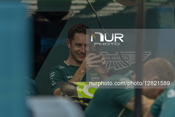 Stoffel Vandoorne is a test and reserve driver for the Aston Martin F1 Team and takes pictures in the team garage during the media day at th...