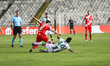 Paul Nebel of Mainz and Novica Erakovic of Omonoia compete for the ball. Omonoia plays aga...