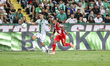 Arnaud Nordin of Mainz and Fotios Kitsos of Omonoia compete for the ball. Omonoia plays ag...