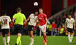 Martin Erlic of FC Midtjylland battles with Chris Wood of Nottingham Forest during the UEF...