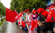 Chinese people in front of the Chancellery of the Prime Minister during a visit of China P...