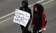 Protesters take part in a demonstration in downtown Mexico City, Mexico, on October 2, 202...
