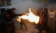 Clashes occur between the Black anarchist bloc and police in the Zocalo, Mexico City, Mexi...