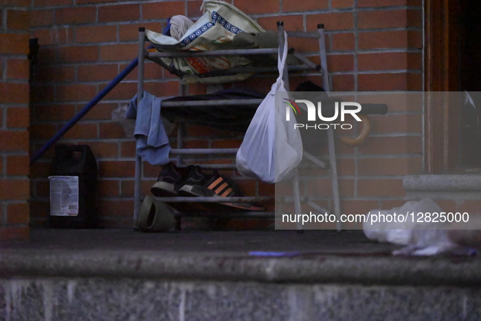 NYPD Officers And Members Of The FDNY Work The Scene After A Man Was Taken Into Custody After Allegedly Stabbing His Mother-in-law To Death And Injuring His Brother-in-law Before Starting A Fire At 45-18 Smart Street