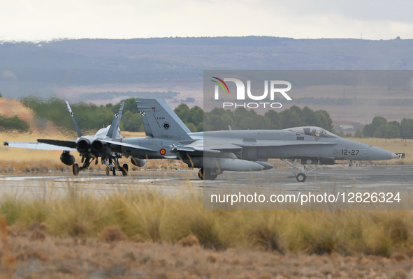 McDonnell Douglas EF-18M Hornet aircraft of the Spain Air Force head towards the runway at Los Llanos Airport during the Tactical Leadership...