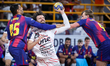 Nedim Remili of Veszprem HC battles for the ball with Seif Elderaa and Jonathan Carlsbogar...