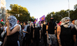 Thousands of people march through central Madrid, Spain, on October 4, 2025, in support of...
