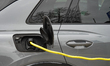 An electric AUDI vehicle charges at a public charging point in Neumarkt in der Oberpfalz,...