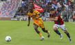 Nicolo Cambiaghi of Bologna FC competes for the ball with Idrissa Toure of Pisa SC during...