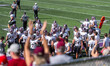 A college football game takes place between the University of Wisconsin-Whitewater Warhawk...