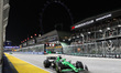 Stake F1 Team driver #27 Nico Hulkenberg from Germany drives along the pit straight past t...