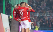 Angel Rodado and his teammates celebrate scoring a goal during the game between Wisla Krak...
