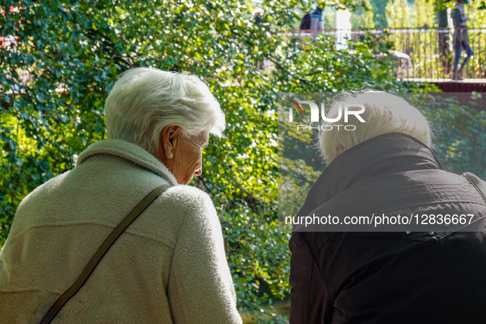 Two Senior Women Talking Outdoors