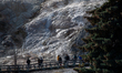 Visitors explore Mammoth Hot Springs at Yellowstone National Park in Yellowstone National...