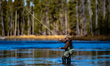 A fly fisherman is seen at Yellowstone National Park on October 6, 2026. 