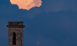 The Full Harvest Supermoon sets behind the Basilica of Our Lady of Martyrs in Molfetta, It...
