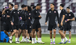 Qatar players warm up during a training session ahead of the FIFA World Cup 2026 AFC Asian...