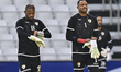 Goalkeepers Faiz Al-Rashidi and Ibrahim Al-Mukhaini of Oman warm up during a training sess...