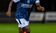 Millenic Alli (7 Luton Town) goes forward during the Vertu Trophy match between Cambridge...