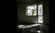 A builder carries out finishing works in an apartment block at 2A Zaporizka Street, where...