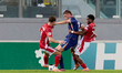 Micky van de Ven of the Netherlands plays against Irvin Cardona and Joseph Mbong of Malta...