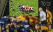 A general view of the big screen shows a scrum during the Gallagher Prem Rugby match betwe...