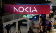A Nokia logo is visible at the India Mobile Congress 2025 in Delhi, India, on October 11,...