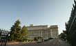 BUCHAREST, ROMANIA – OCTOBER 10:The Palace of Parliament is seen from the entrance gate i...