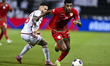 Marcus Vinicius of the United Arab Emirates and Abdul Rahman Al Mushaifri of Oman are in a...