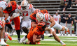 Asher Weiner, 10, is tackled by Mac Bradley, 34, during a game at Princeton Stadium during...