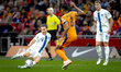 Finland midfielder Leo Walta and Netherlands midfielder Ryan Gravenberch play during the m...