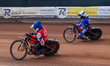 Harry Fletcher of Belle Vue Colts, in blue, rides inside Jordy Loftus of Monarchs, in whit...