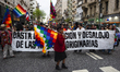 People take part in the demonstration for ommemorates the Day of Respect for Cultural Dive...