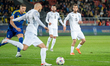 Emin Makhmudov and Abdulakh Khaybulayev play during the FIFA World Cup 2026 Qualifier matc...
