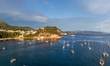A drone view of boats anchored near Valtos Beach and the Venetian Castle of Parga in Parga...