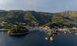 Aerial sunset view of the Venetian Castle of Parga and the town’s old harbor in Parga, Gre...