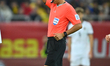 Referee Davide Massa of Italy officiates during the FIFA World Cup 2026 qualifier match be...