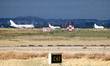 An Airbus A-310 and two Falcon 900s of the Spanish Air Force prepare for takeoff from Torr...