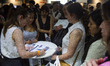 Thousands of unemployed young people and adults attend the BA Employment Expo in La Rural,...