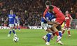 Hayden Hackney of Middlesbrough threads the ball through two Ipswich Town defenders and ge...