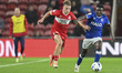 Tommy Conway of Middlesbrough races to get the ball before Azor Matusiwa of Ipswich Town d...
