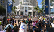 Protesters in Orlando, Florida, on Saturday morning, hold flags and chant the slogan ''No...