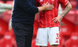 Ange Postecoglou, the Nottingham Forest head coach, is with Neco Williams of Nottingham Fo...