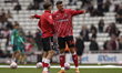 Chris Rigg and Granit Xhaka of Sunderland speak during the warm-up during the Premier Leag...