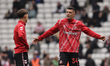 Chris Rigg and Granit Xhaka of Sunderland speak during the Premier League match between Su...