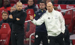 Head Coach John Heitinga of AFC Ajax and Assistant Trainer Marcel Keizer of AFC Ajax are p...
