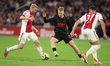 Davy Klaassen of AFC Ajax and Kees Smit of AZ participate in the match between Ajax Amster...