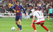 Pedri and Daley Blind play during the match between FC Barcelona and Girona FC, correspond...