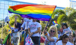 The LGBTQIA+ community parades at Come Out With Pride around Lake Eola in Central Florida,...