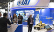 Military officials and visitors from various countries tour the IAI booth during the Seoul...